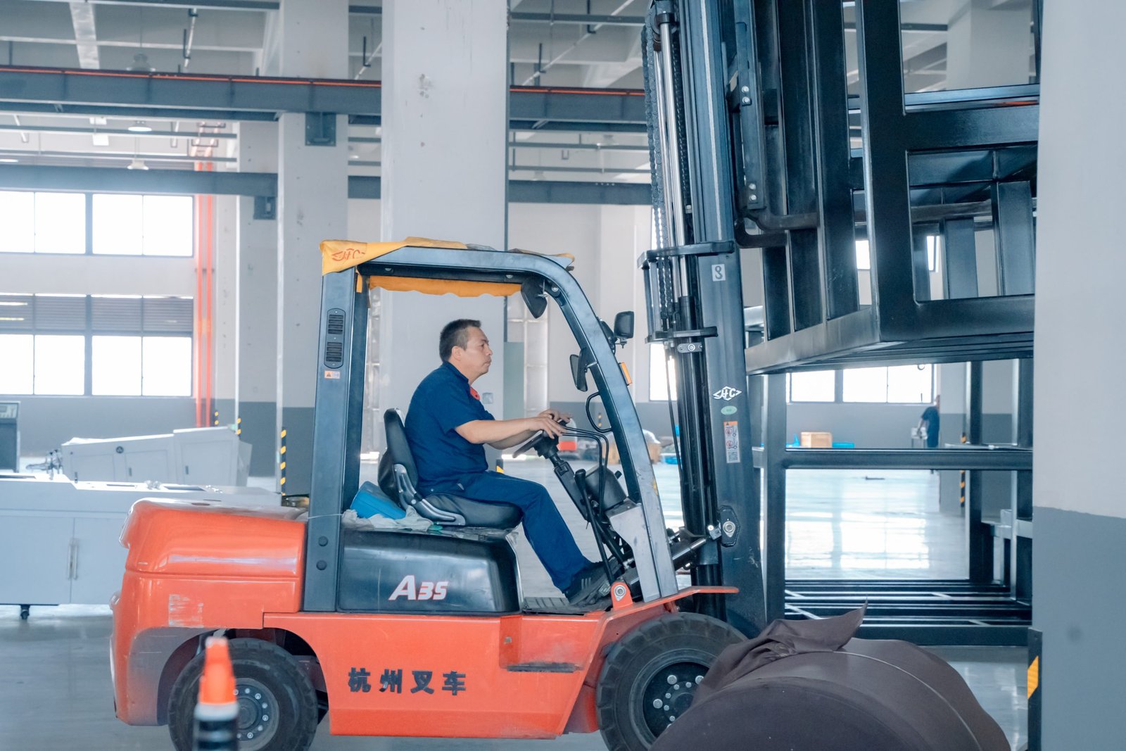 In-facility transport of a completed machine to the shipping area