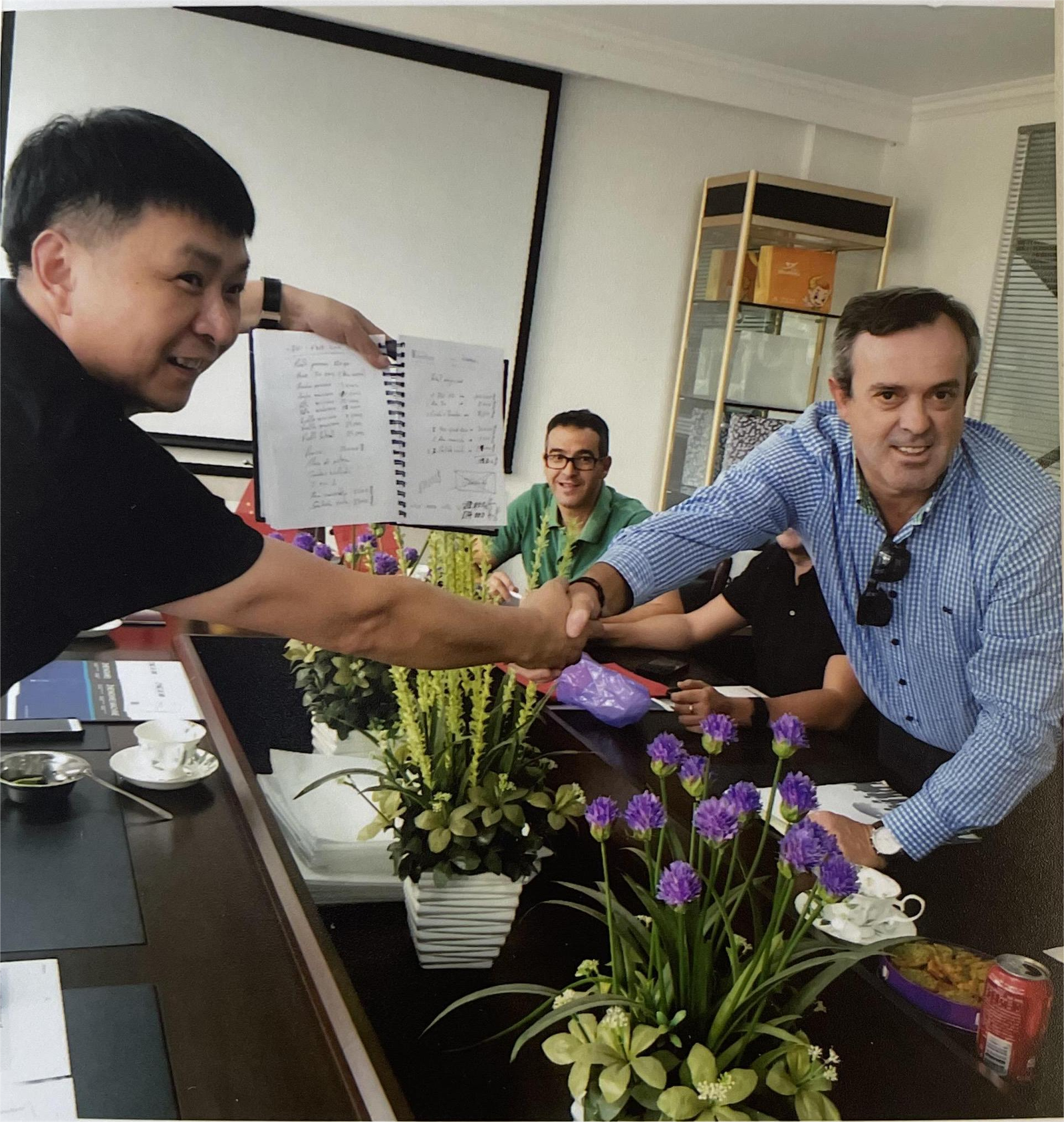 Commercial discussions with European clients at the ZHENGWEI exhibition stand