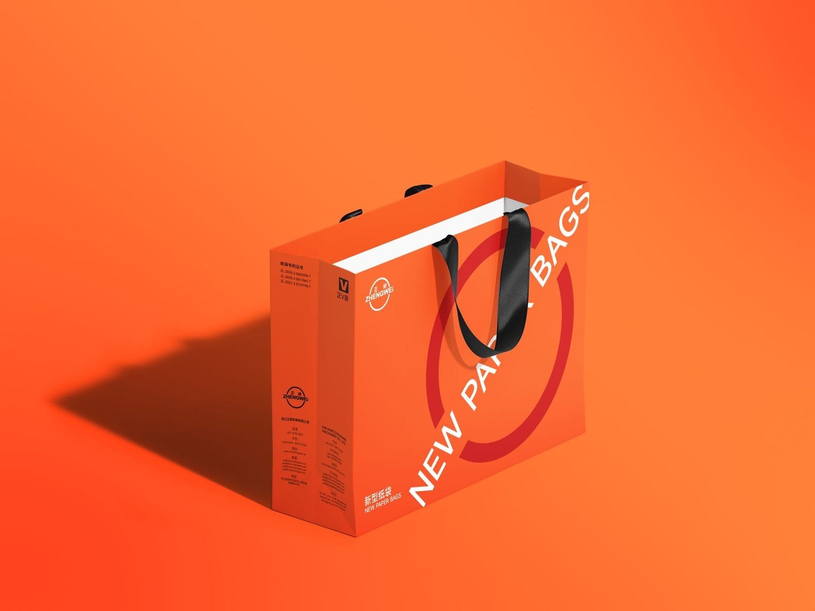 Printed paper bag sample photographed against an orange backdrop