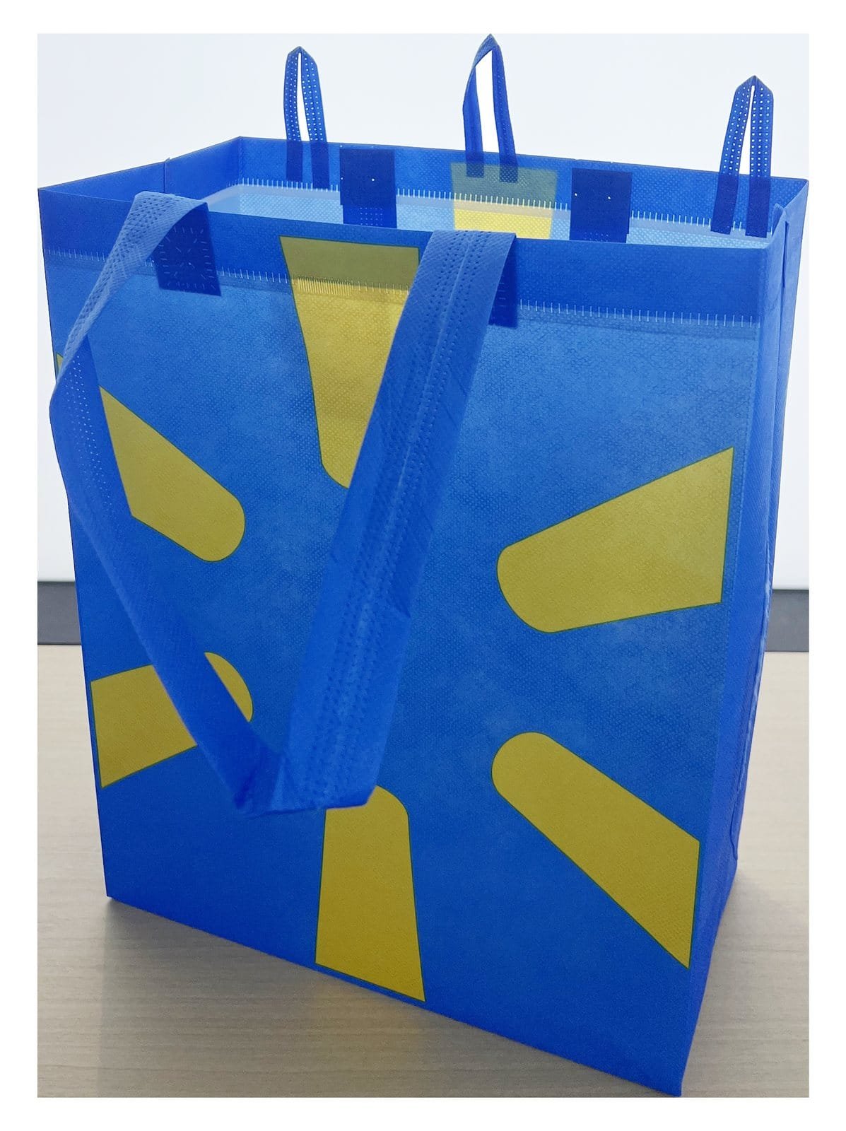 Blue RPET non-woven bag sample with yellow printed pattern